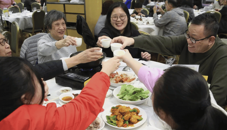 Locals celebrating Chinese Winter Solstice with traditional foods